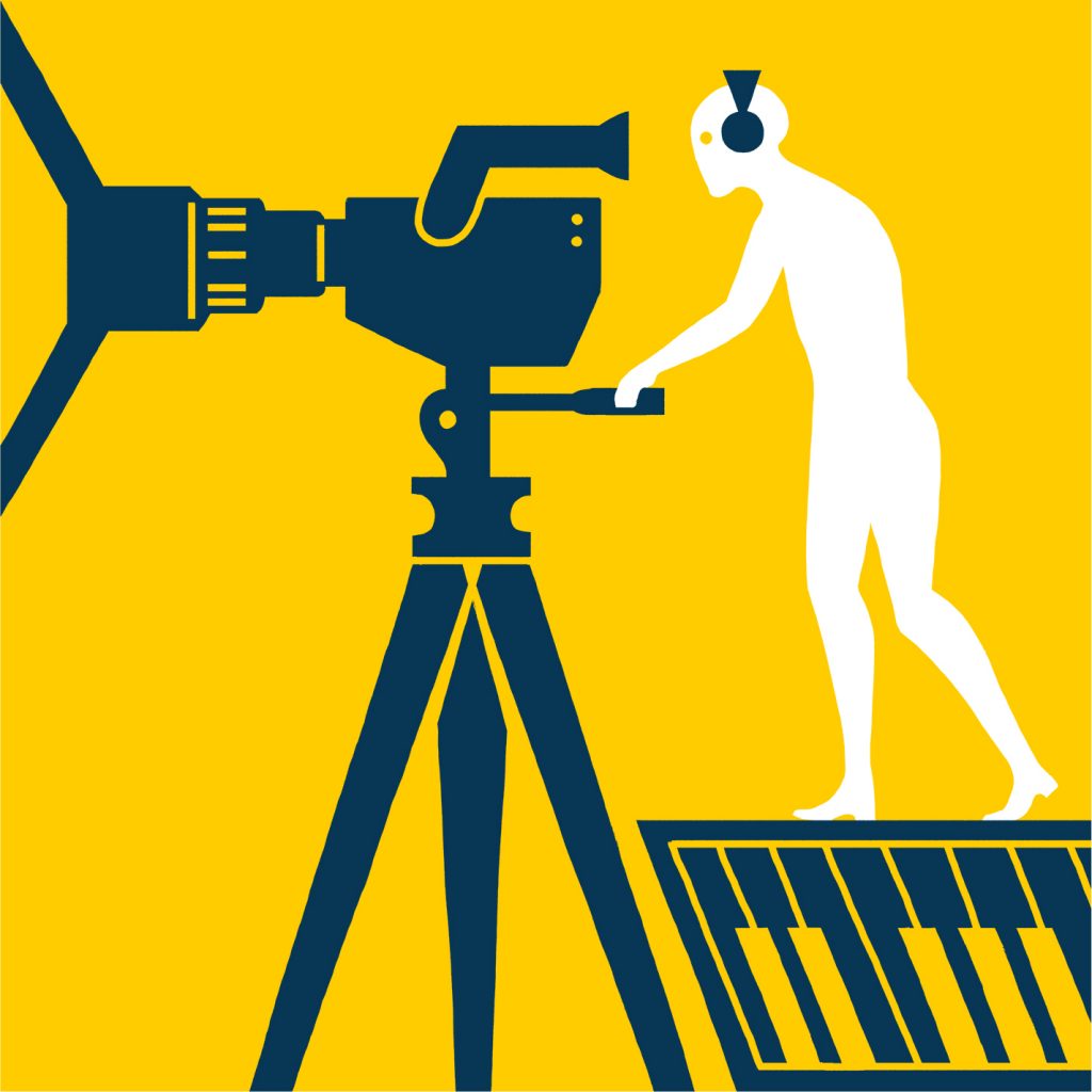 Cluster ICC: audiovisivo e musica (operatore in piedi guarda dentro una cinepresa)